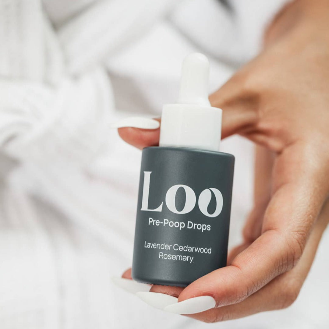 Lavender Cedarwood Rosemary Pre-Poop Toilet Drops, a toilet air freshener in a convenient dropper bottle.