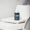 Lavender Cedarwood Rosemary Pre-Poop Toilet Drops, a toilet air freshener in a convenient dropper bottle.