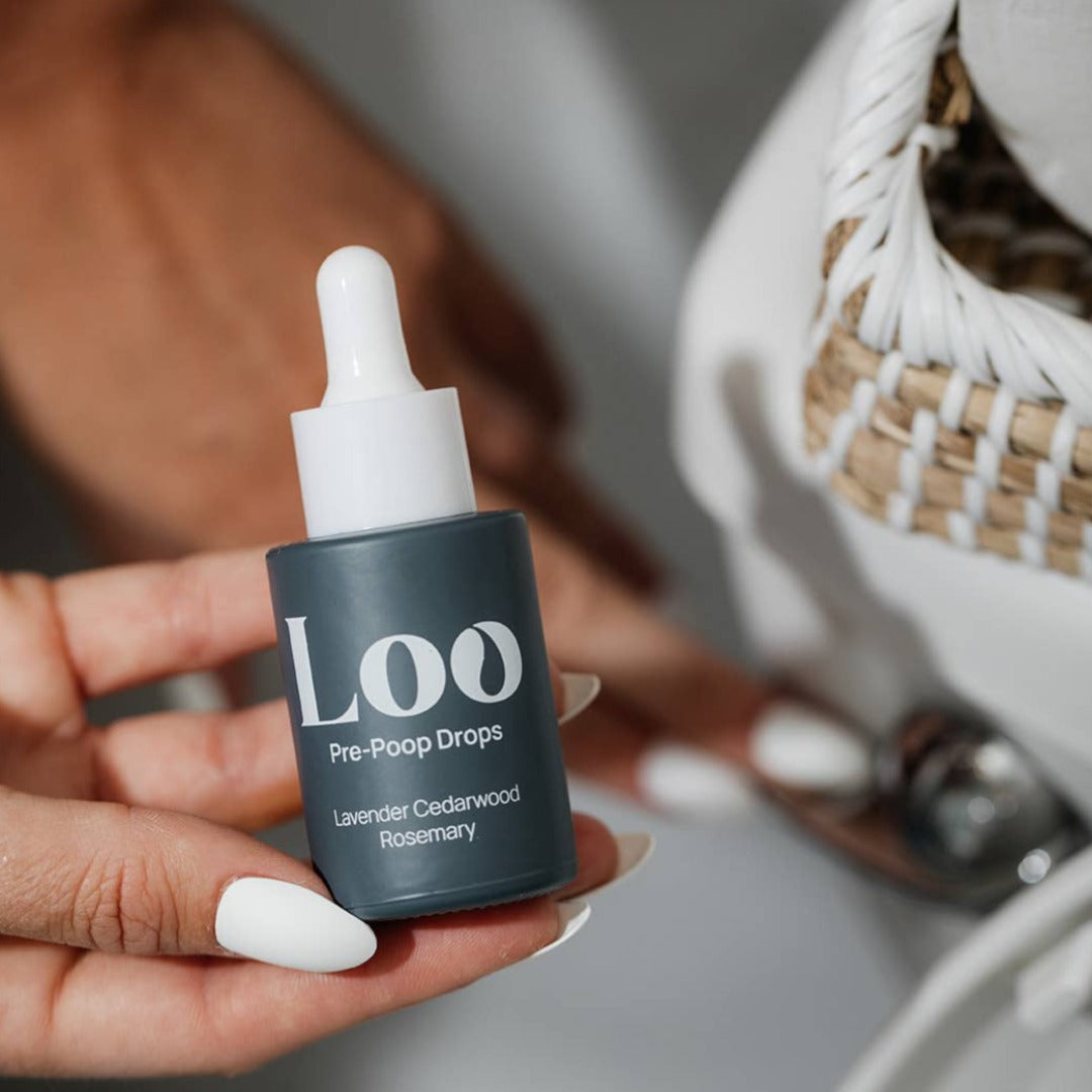 Lavender Cedarwood Rosemary Pre-Poop Toilet Drops, a toilet air freshener in a convenient dropper bottle.