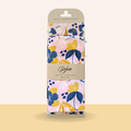 Floral patterned reusable food wrap set in packaging on a beige background