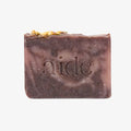 Bar of soap with 'aide' branding on a white background