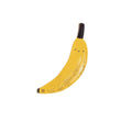 Yellow banana with a face on a white background