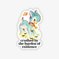 Sticker with a cute deer design and text 'crushed by the burden of existence' on a white background