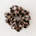 Plaid scrunchie on a white background