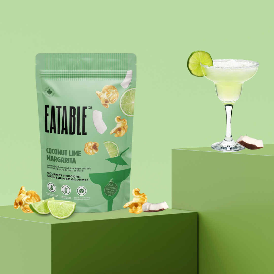 Eatable coconut lime margarita snack package with a cocktail on a green background