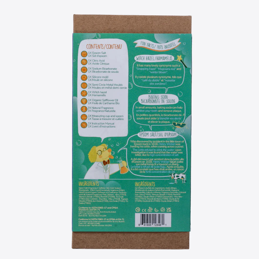 A cardboard box containing a Kiss Naturals Bath Bomb Kit. The box is green and white with the product name and a colorful illustration of bath bombs. It states that the kit is 100% natural, made in Canada, and suitable for ages 6 and up.