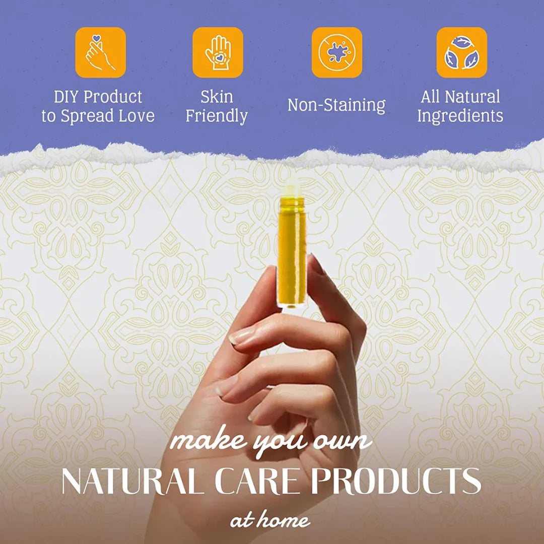 A cardboard box containing a Kiss Naturals Lava Lip Gloss Kit. The box is orange and white with the product name and a colorful illustration of a dragon. It states that the kit is 100% natural, made in Canada, and suitable for ages 6 and up.