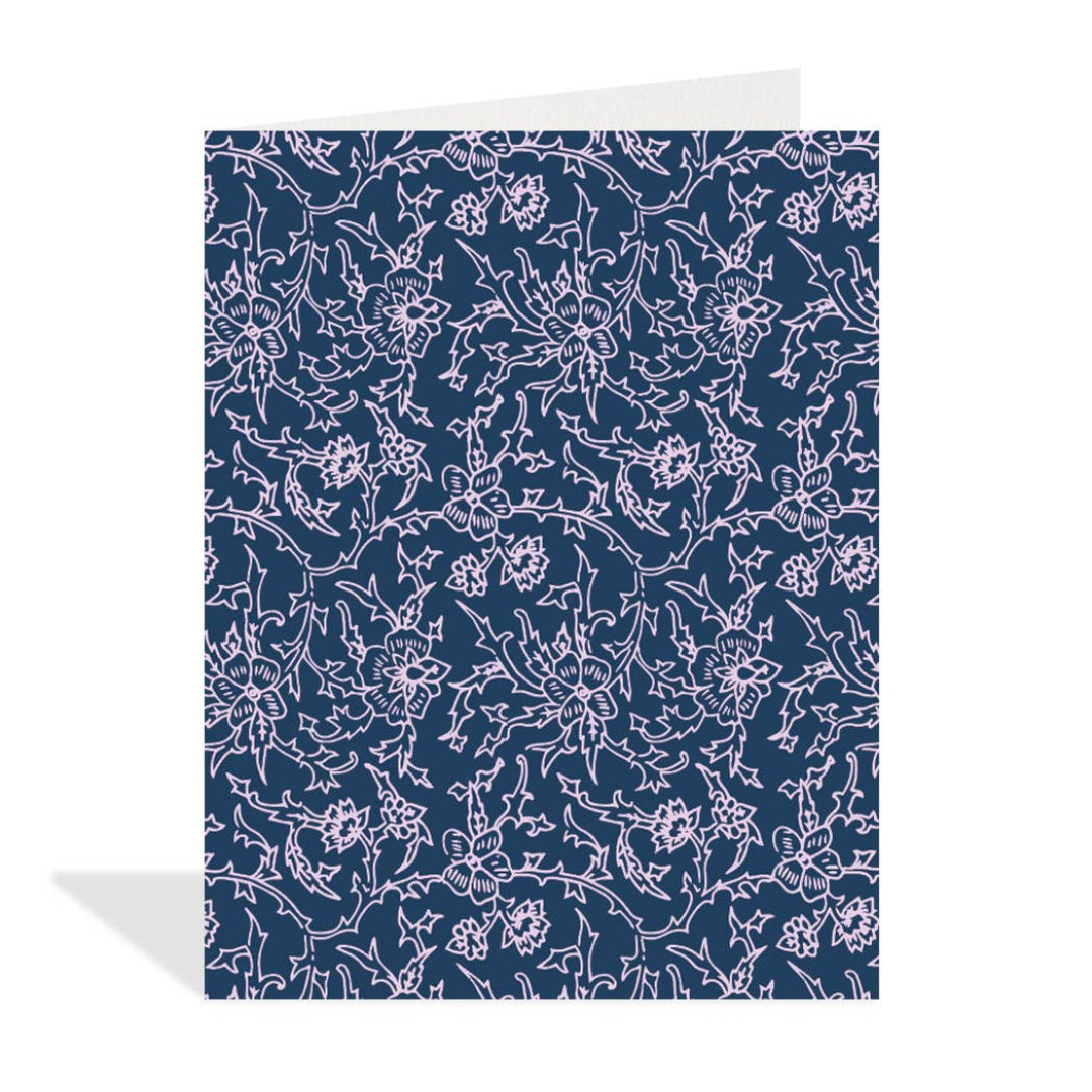 Floral patterned card with white flowers on a blue background