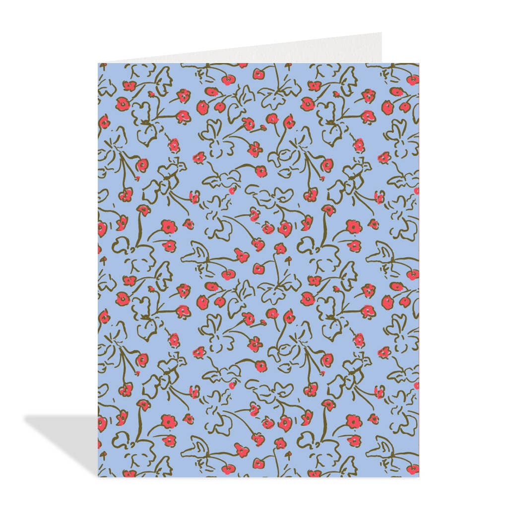 Greeting card with floral pattern on a blue background