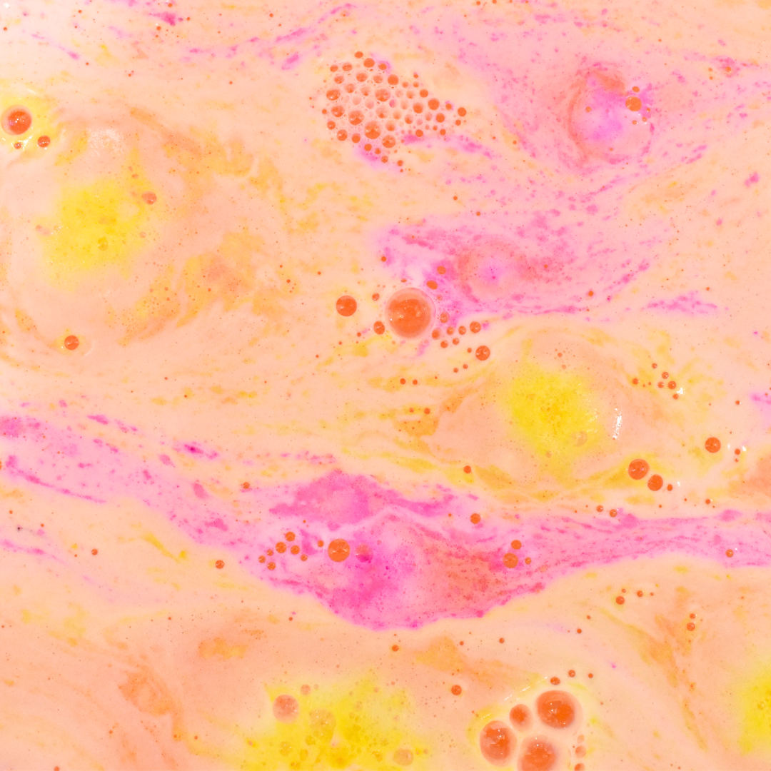 Colorful abstract pattern with pink, yellow, and orange hues.