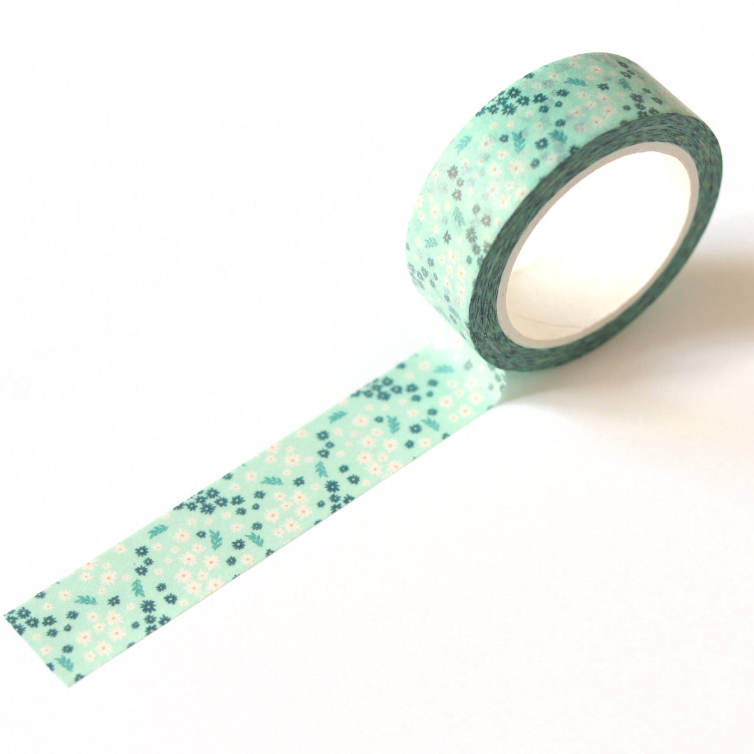 Roll of decorative tape with a pattern on a white background