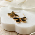 Gold Forget Me Not Earrings, gold post earrings in a flower shape.