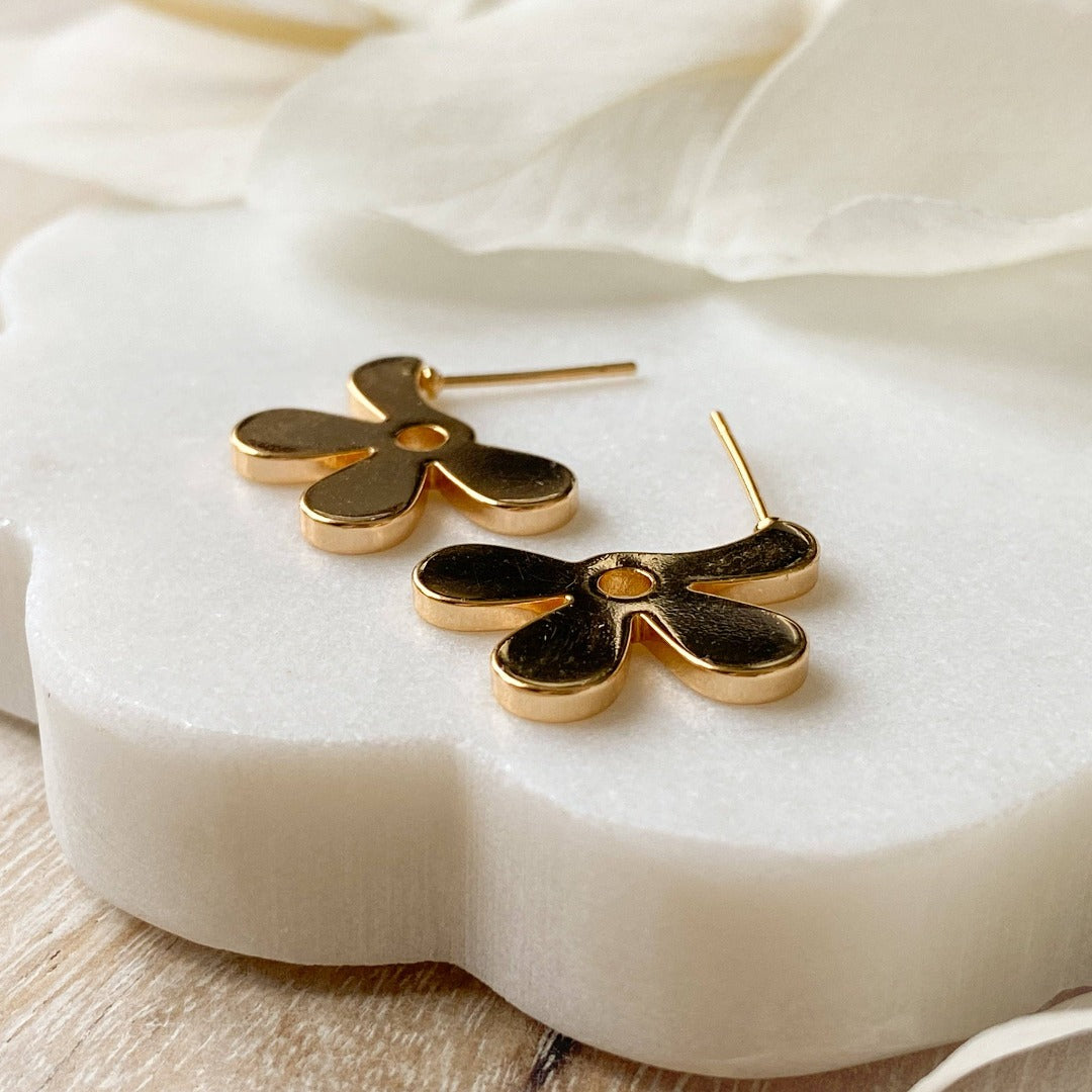 Gold Forget Me Not Earrings, gold post earrings in a flower shape.