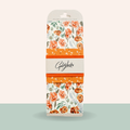 Packaged product with floral design and 'Goldjacks' branding on a light gray background