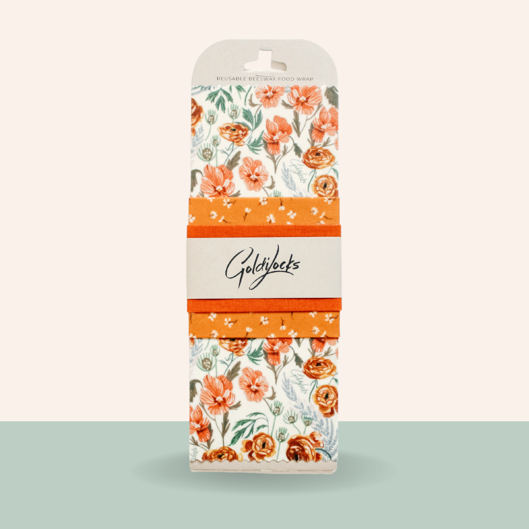 Packaged product with floral design and 'Goldjacks' branding on a light gray background