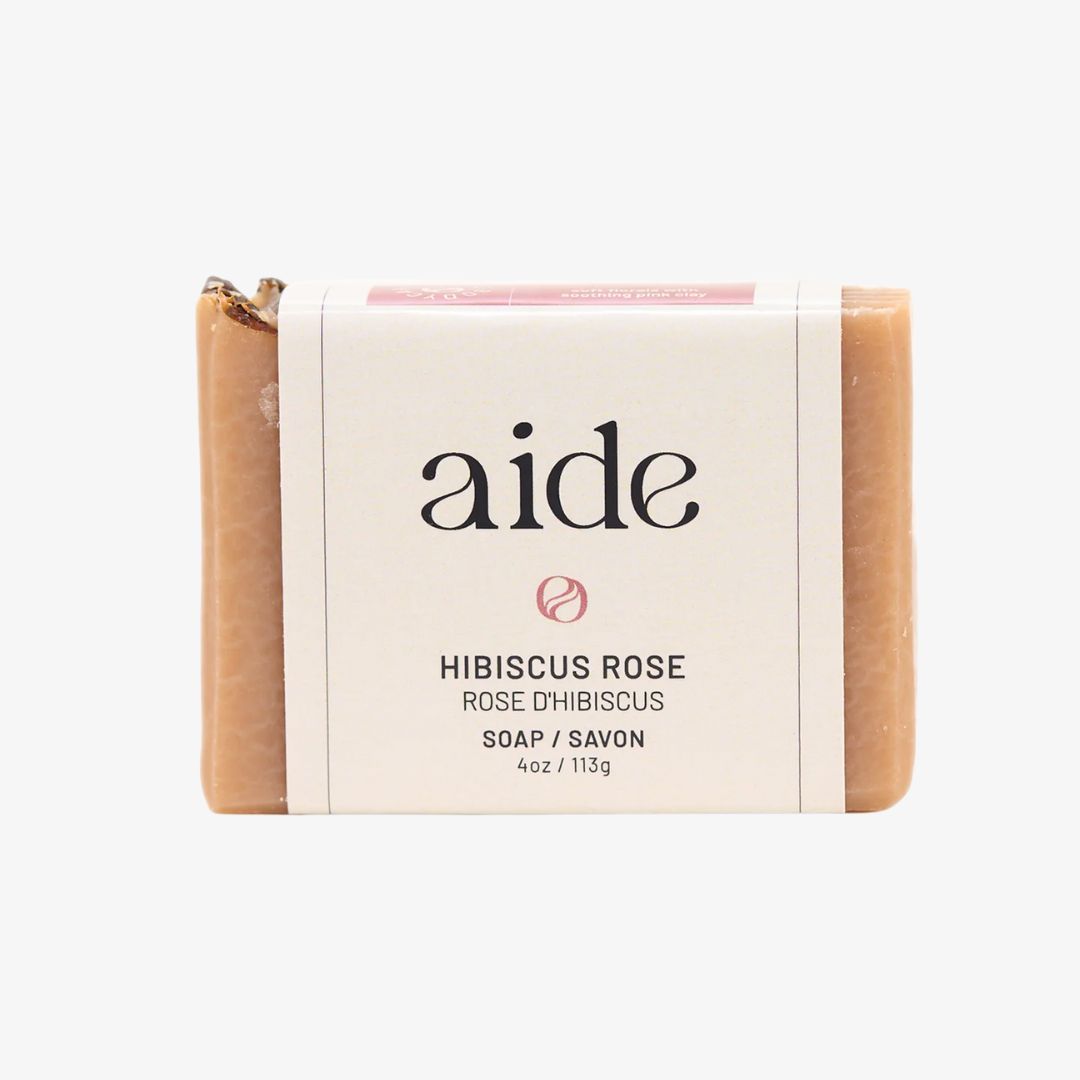 Bar of soap with 'aide' branding on a white background
