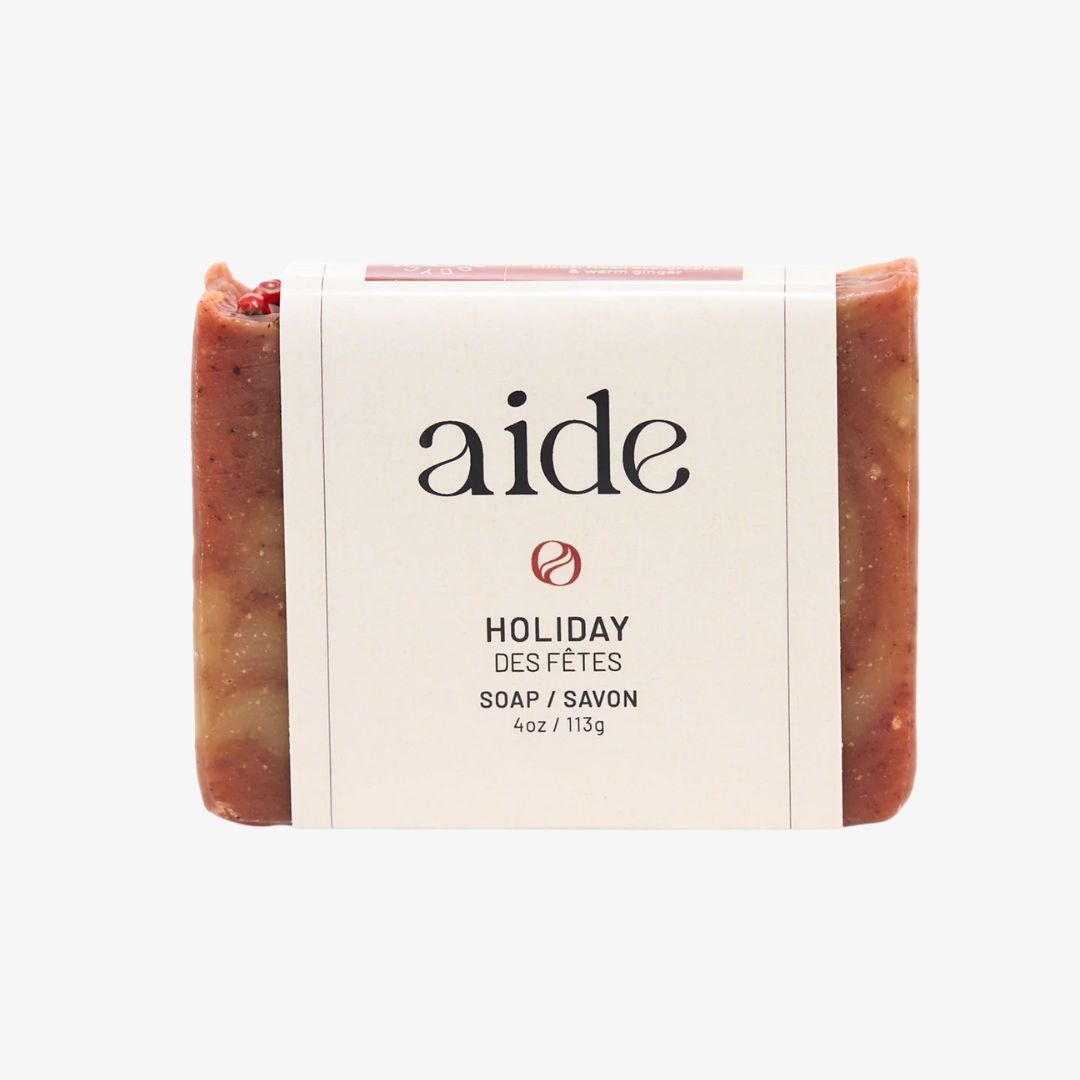 Bar of soap with 'aide' branding on a white background