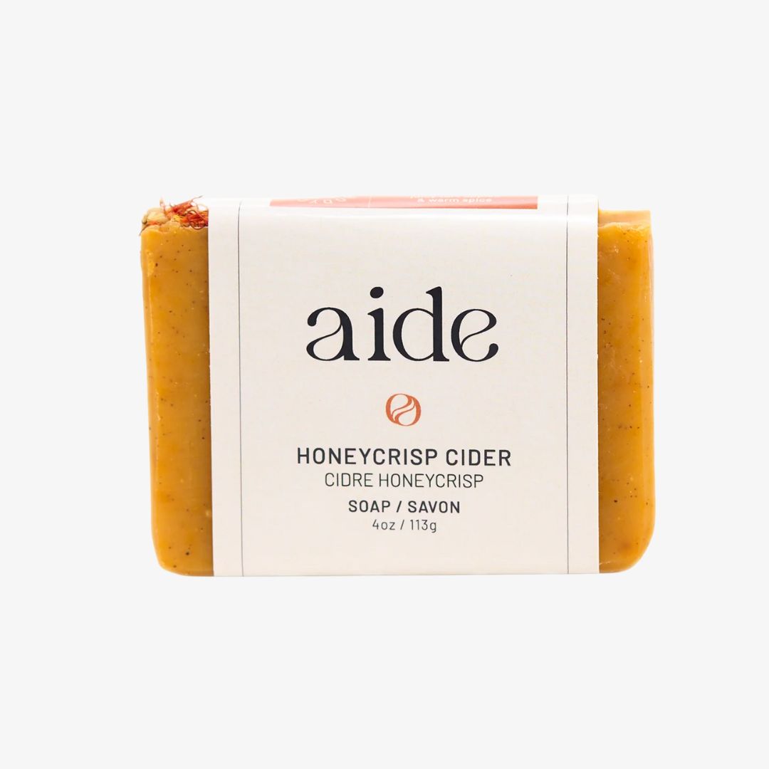 Bar of soap with 'aide' branding on a white background