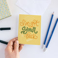 A card with a yellow background and the text "I've got your back" in green and orange lettering.