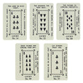 A dark grey card with white decorative borders. The top text reads "PICK A CARD" and below it, "YOUR KINDNESS WILL BE REWARDED, A POSITIVE OUTLOOK FORESEEN". At the bottom, five light green and white playing card-like fortunes are fanned out and held by a paperclip.