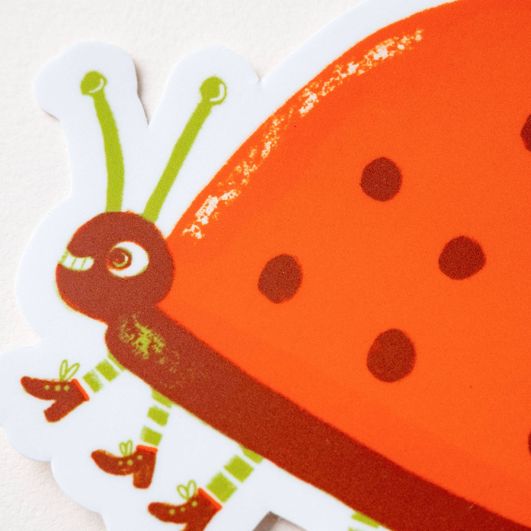 Cartoon ladybug sticker on a white background