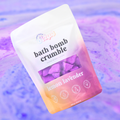 Bath bomb crumble packaging with lemon lavender scent on a colorful background