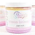 Jar of lemon lavender sugar scrub with 'Small Batch Soaps' branding on a white background.