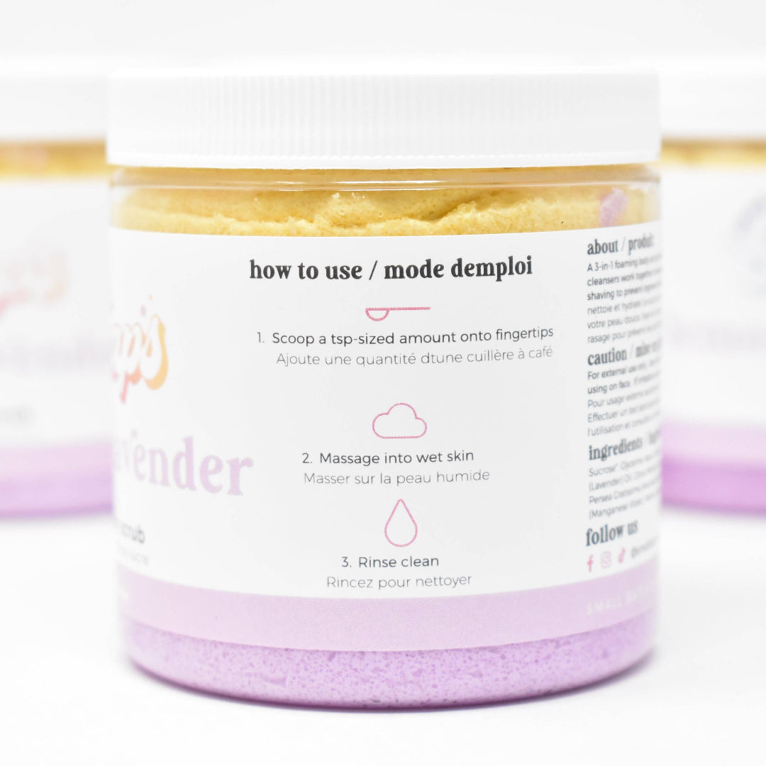 Jar of lavender body scrub with label on a white background