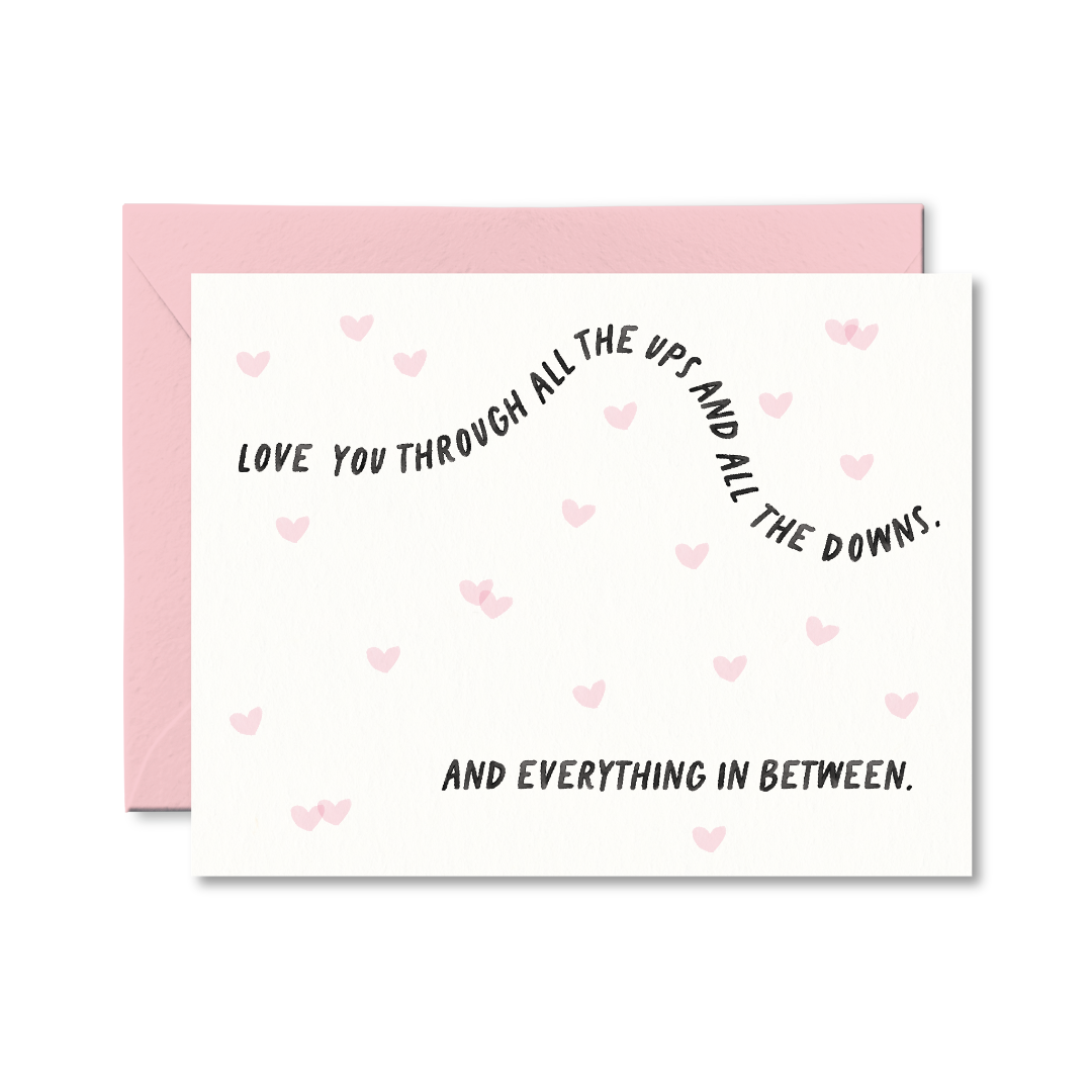 Greeting card with romantic message and pink hearts on a white background