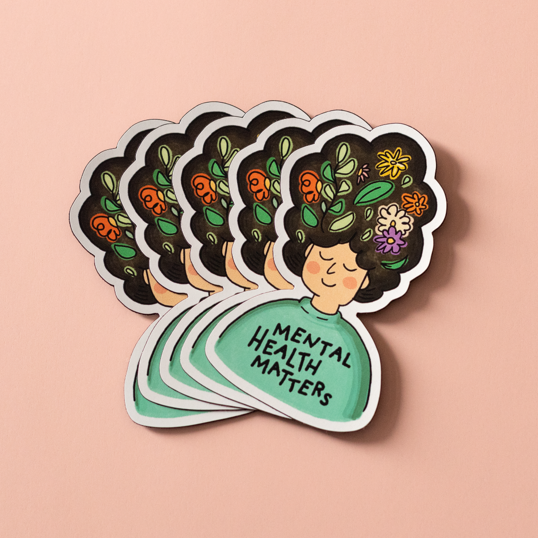 Mental Health Matters vinyl sticker is an illustration of a person with flowers in their big hair and the words "MENTAL HEALTH MATTERS" on their shirt.