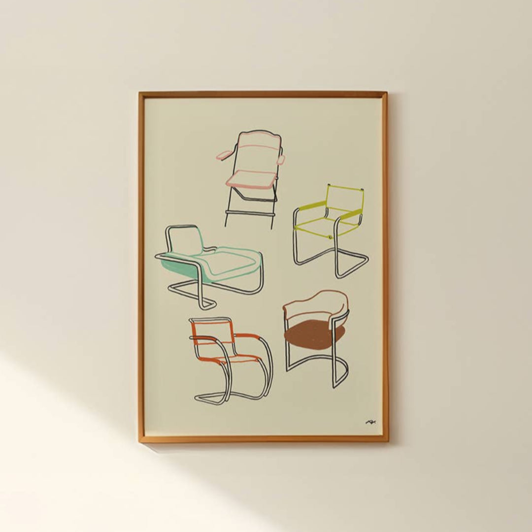 Framed artwork of colorful chairs on a beige wall