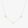 A delicate gold-filled necklace spelling out 'MOM' with individual letter charms evenly spaced along a fine chain, displayed on a white background. This heartfelt necklace is available in Ottawa, Ontario, Canada.