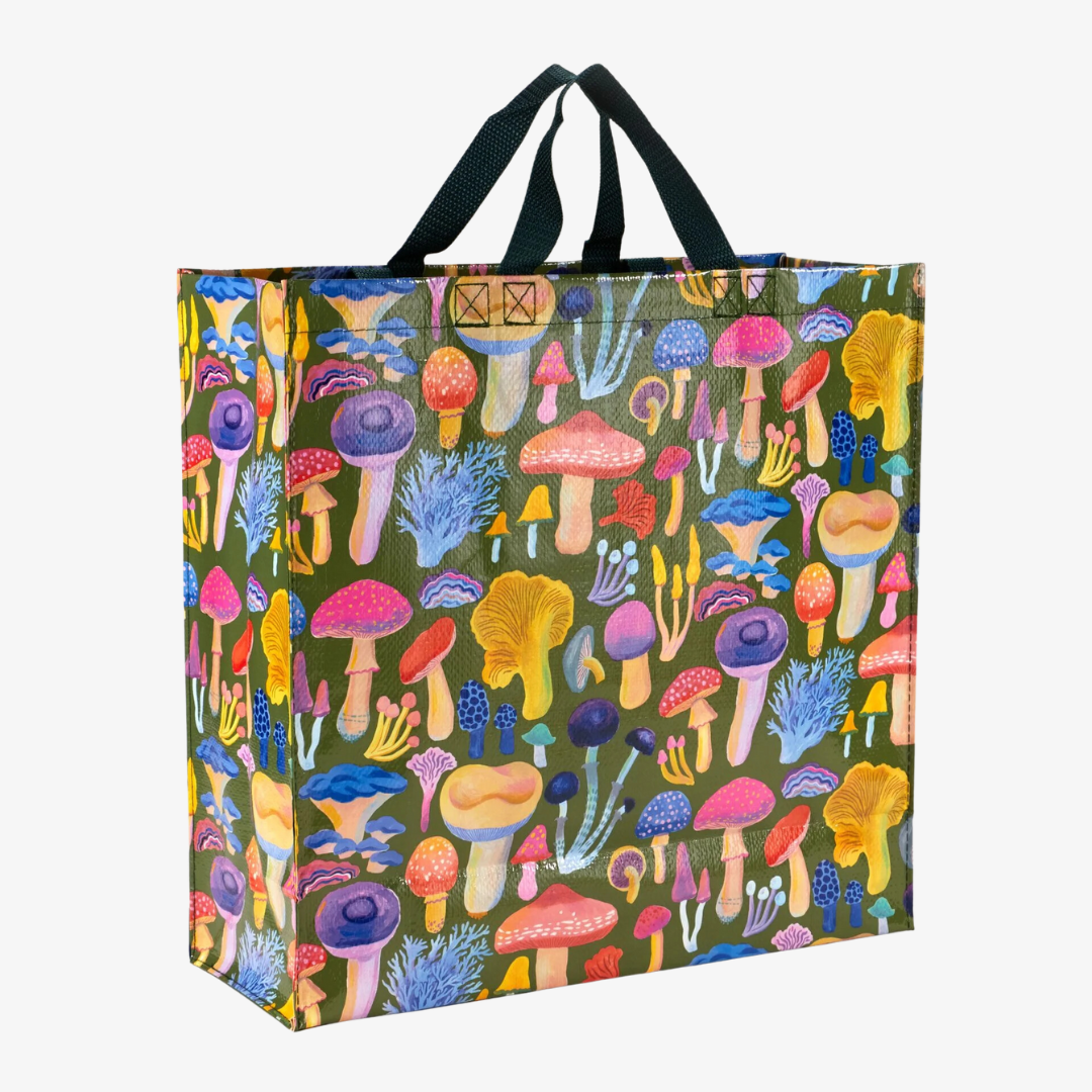 A reusable tote bag with a mushroom pattern. The bag is olive green with black handles. It is covered in a variety of colorful mushrooms in different shapes and sizes.