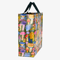 A reusable tote bag with a mushroom pattern. The bag is olive green with black handles. It is covered in a variety of colorful mushrooms in different shapes and sizes.