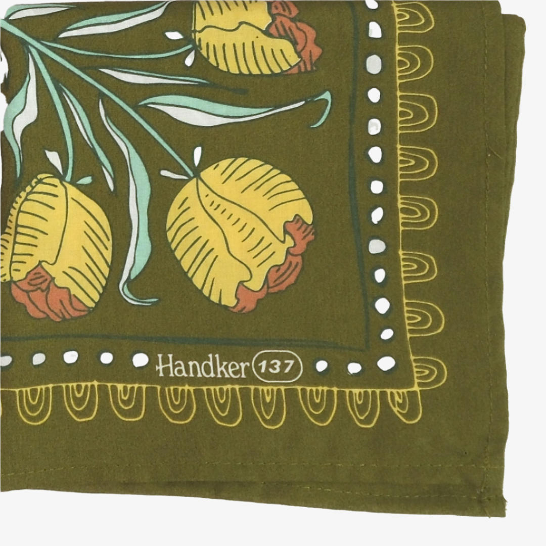 Green handkerchief with floral patterns and 'Handker 137' branding.