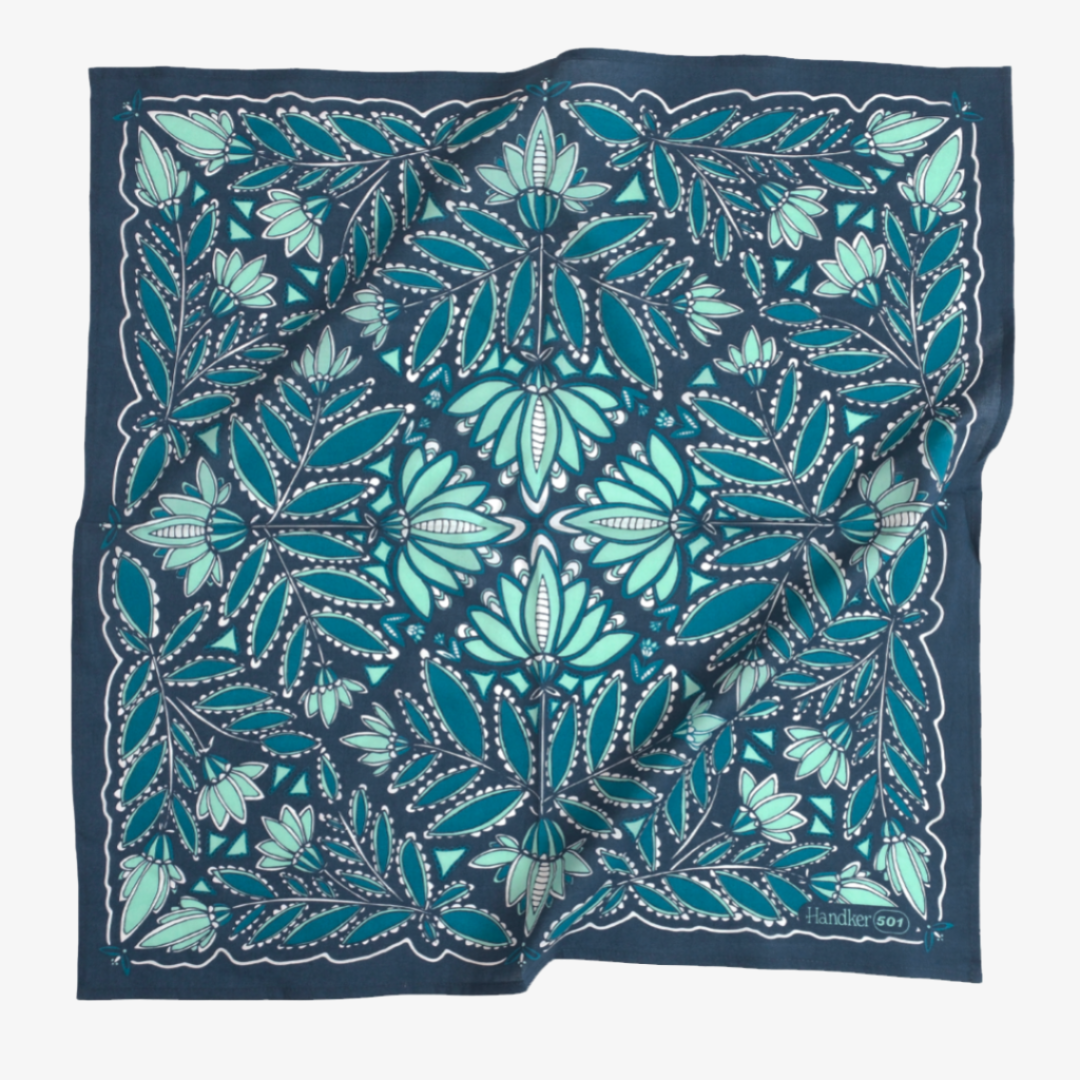 Navy blue scarf with green butterfly pattern on a white background