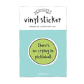 Vinyl sticker packaging with a green sticker and text on a light blue background