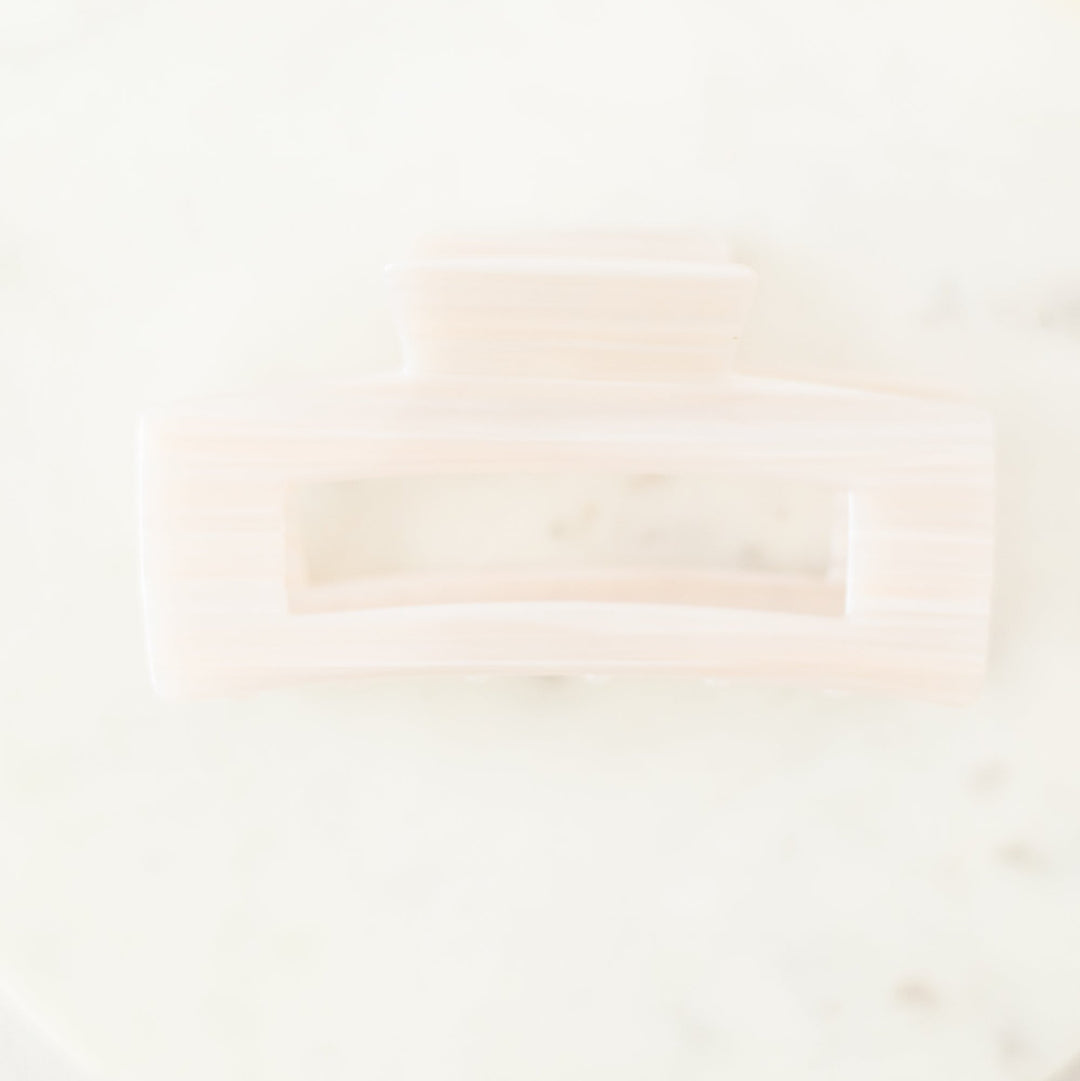 Close-up of a white plate with a blurred background