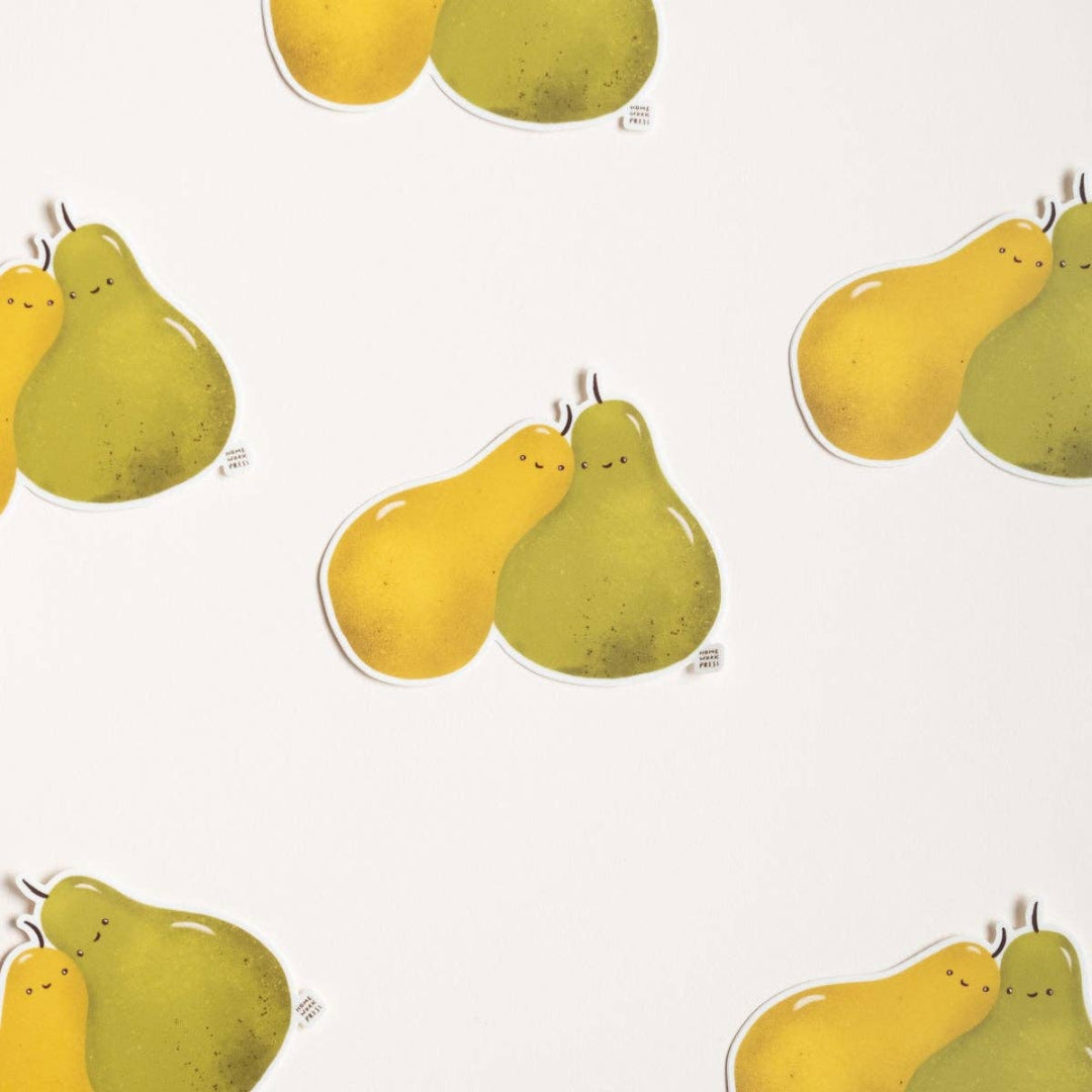 Pattern of green and yellow pears on a white background