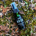 Peppermint & Tea Tree Bare Bush After-Shave a soothing after shave oil in a green spray bottle.