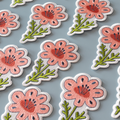 Floral and leaf patterns on a gray background