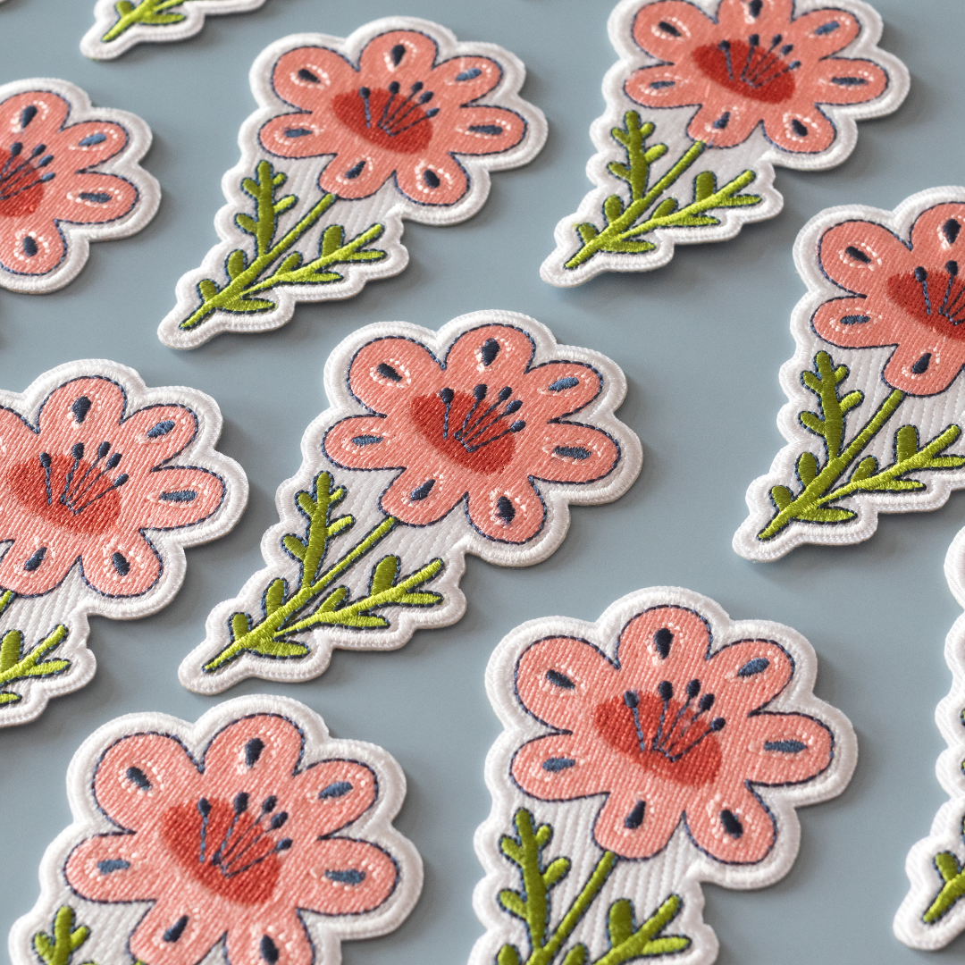 Floral and leaf patterns on a gray background