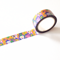 Colorful tape with a pattern of cartoon faces on a white background