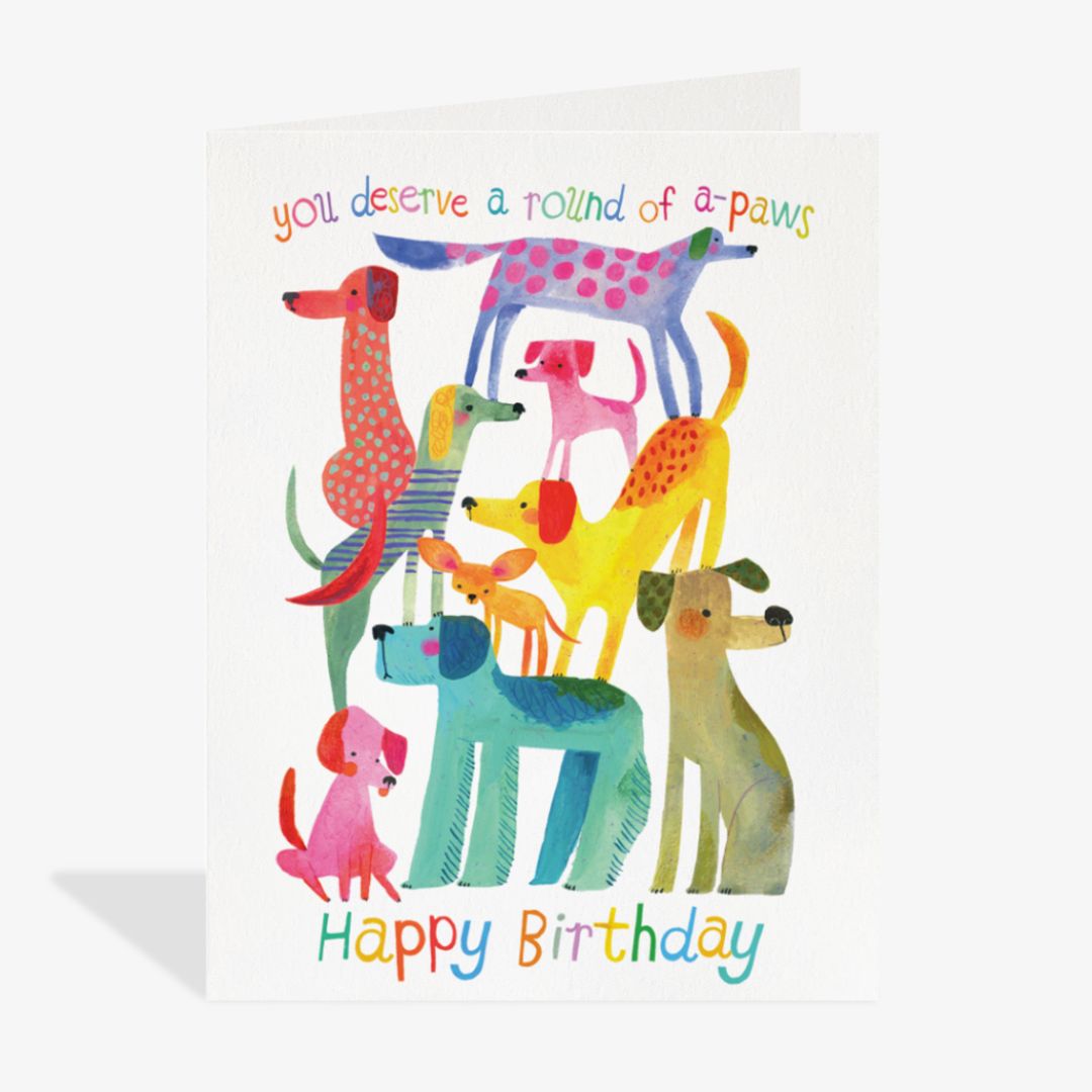 Colorful birthday card with cartoon dogs and text on a white background