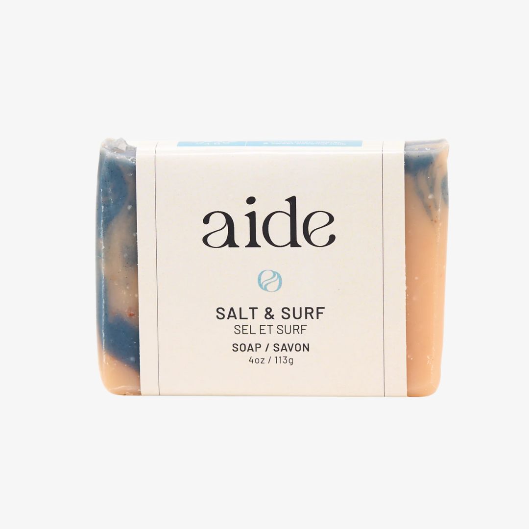 Bar of soap with 'aide' branding on a white background