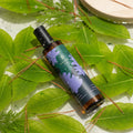 Bottle of Balter Co. product on green leaves with a natural background