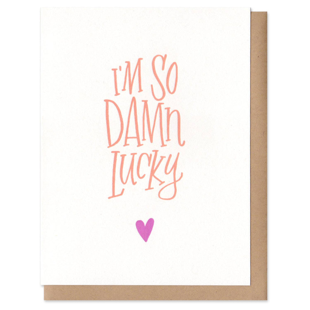 Card with 'I'm so damn lucky' text and a heart on a white background