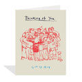 Greeting card with red illustration of people hugging and text 'Thinking of You. Group Hug' on a beige background.