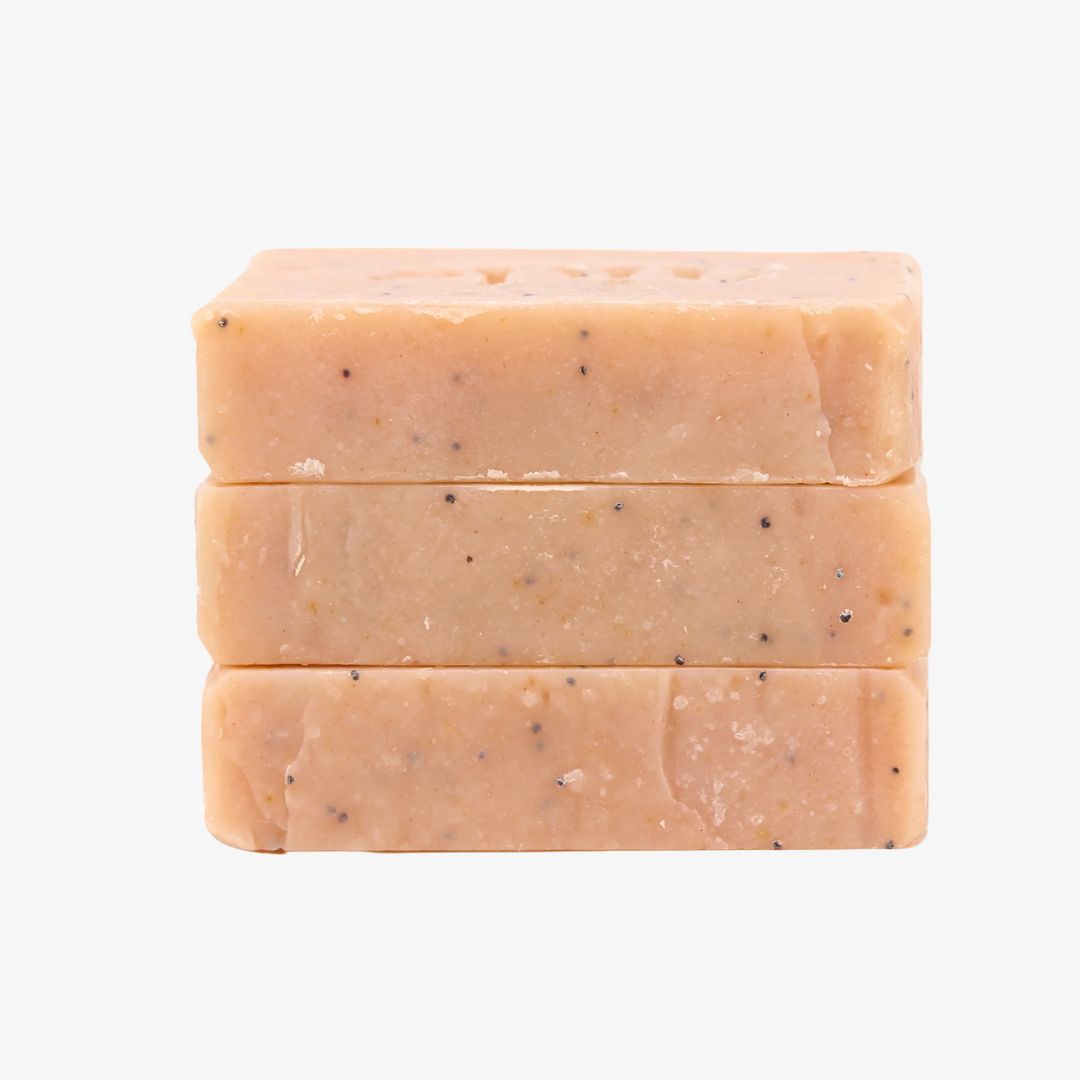 Three stacked bars of soap on a white background
