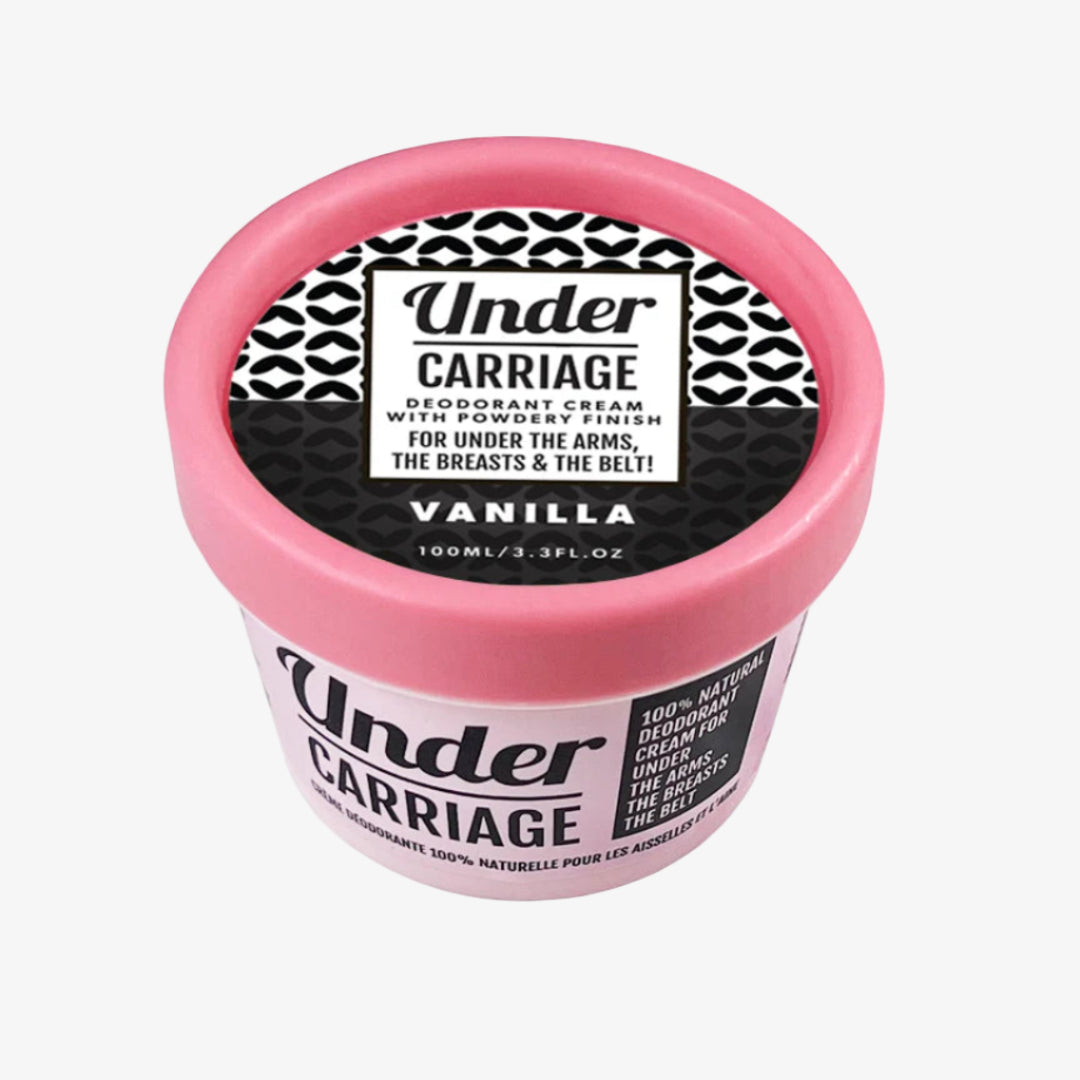 Pink container of Under Carriage deodorant cream with black and white label on a white background